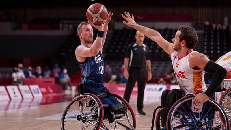 Wheelchair basketballer Gregg Warburton lines up a shot at the basket