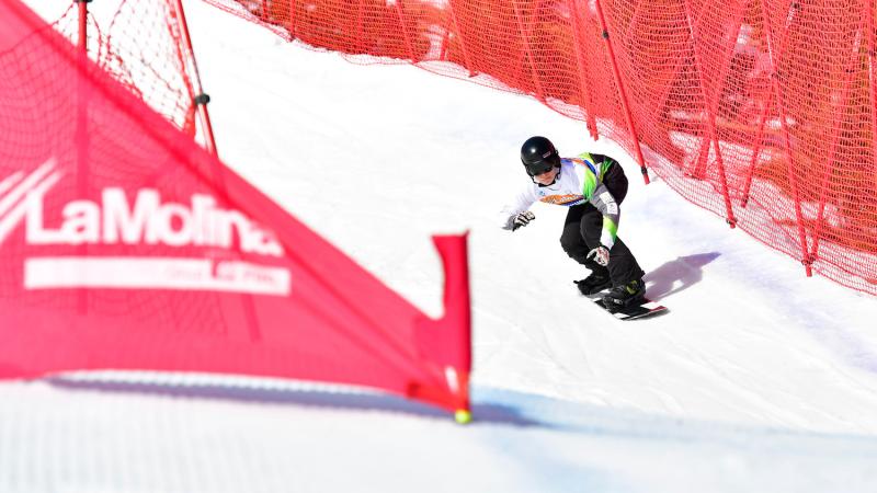 A man snowboarding