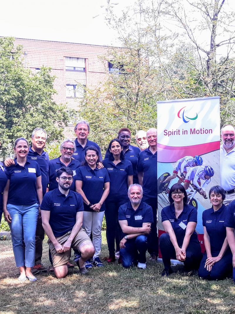 Group photo of dozens of people 