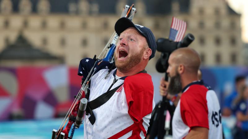 Para archer Matt Stuzman screams in delight after winning gold