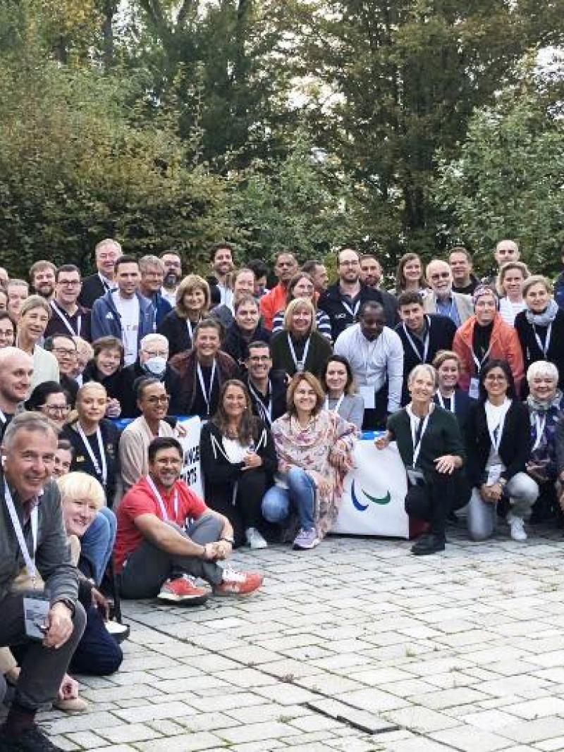 About 100 attendees of the IPC Annual Classification Meeting pose for a group picture 